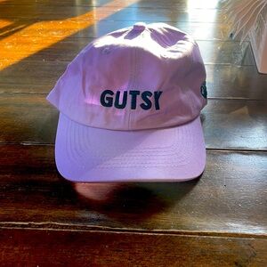 Olivia Rodrigo purple gutsy world tour hat